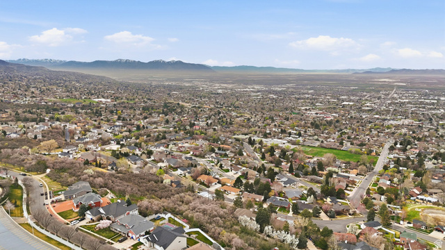 331 South 1550th Street East, Unit 3 Bountiful, UT 84010 - Photo 19 of 30 Aerial view of residential area with mountains