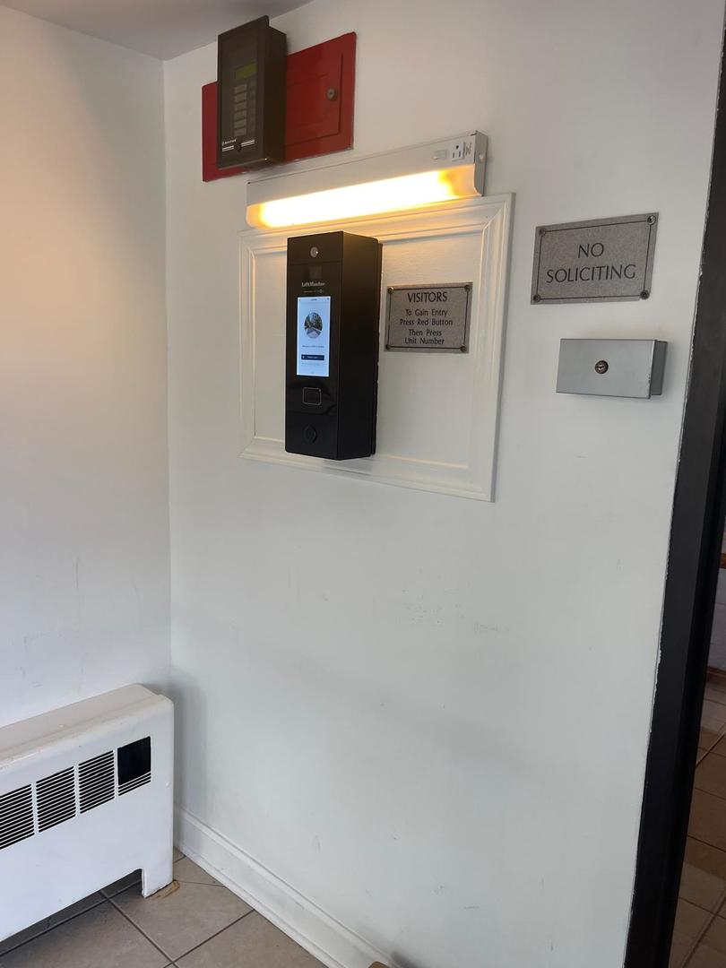 1000 South Lorraine Road, Unit 214 Wheaton, IL 60189 - Photo 11 of 12 a view of a hallway with entryway