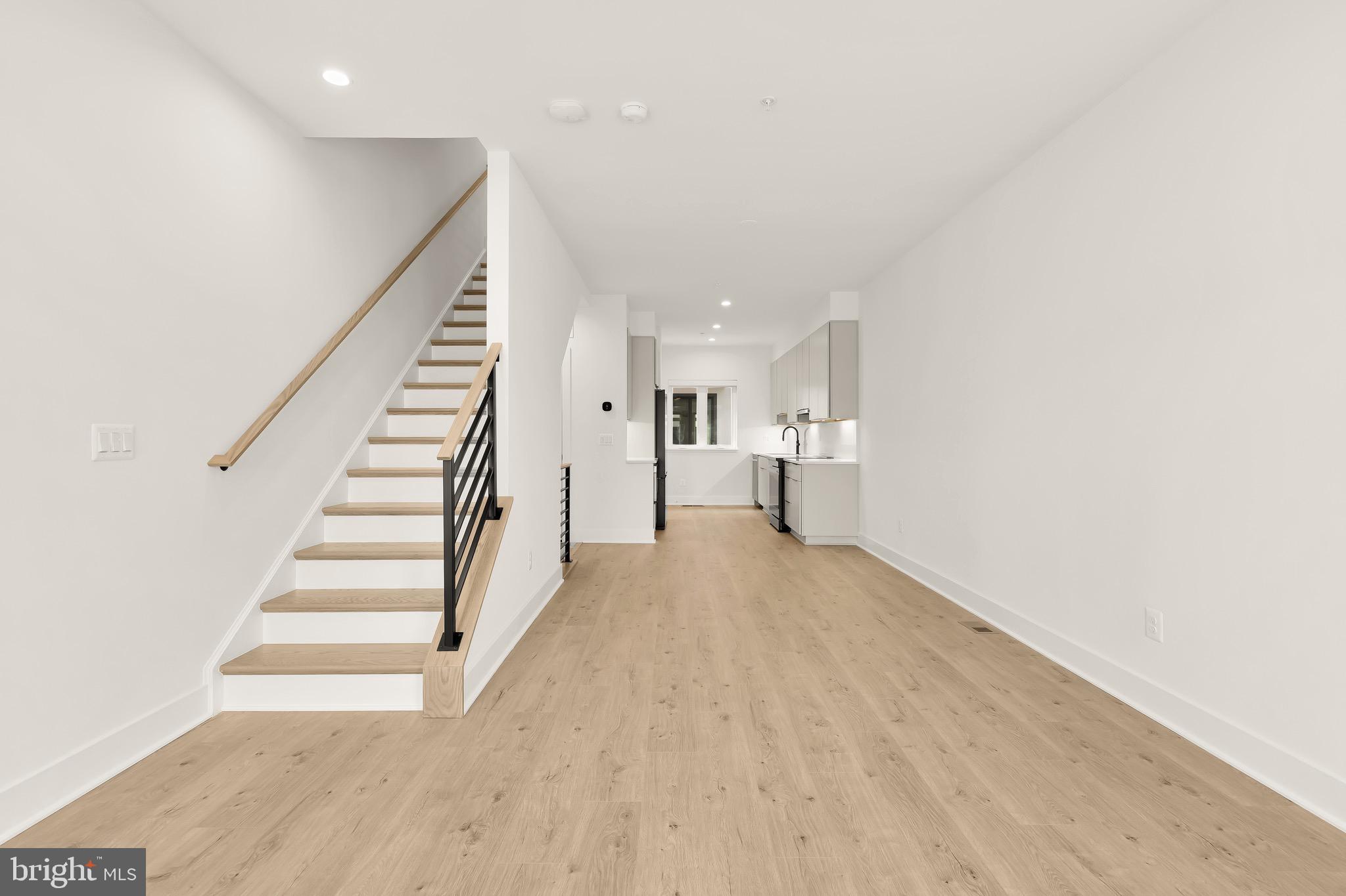 2608 Olmsted Court Northwest Washington, DC 20422 - Photo 23 of 39 a view of entryway and hall with wooden floor