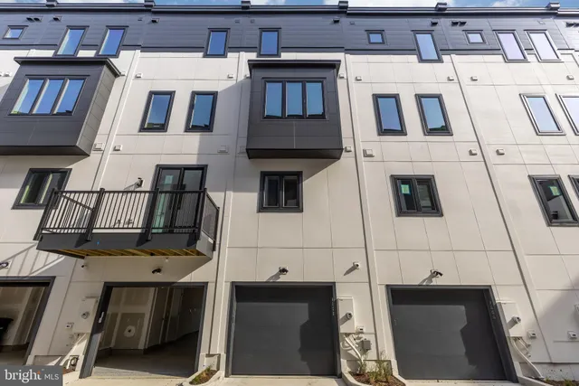 a view of a hallway with stairs