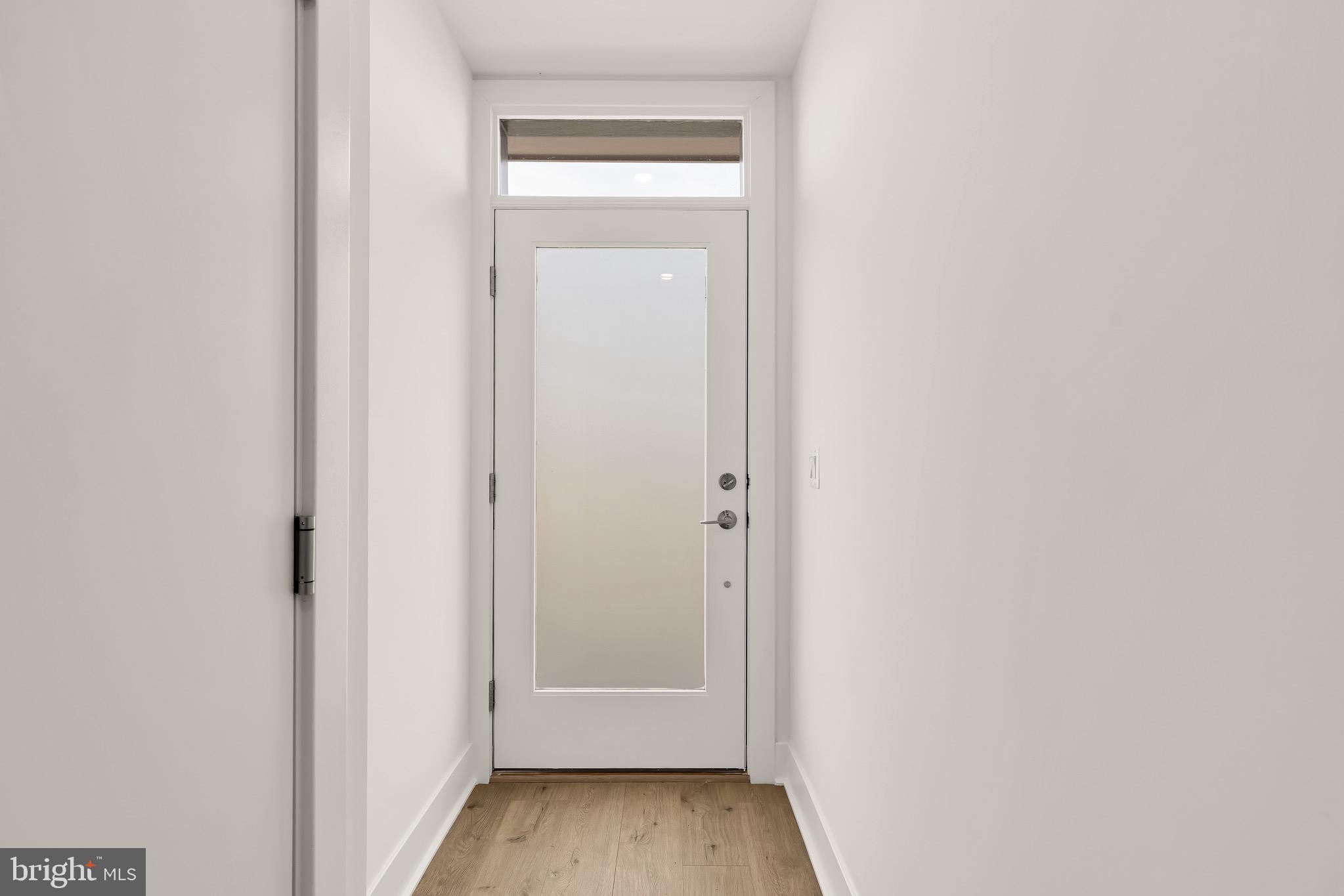 2608 Olmsted Court Northwest Washington, DC 20422 - Photo 5 of 39 a view of a hallway with wooden floor