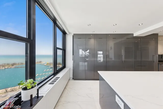 a bathroom with a tub and shower