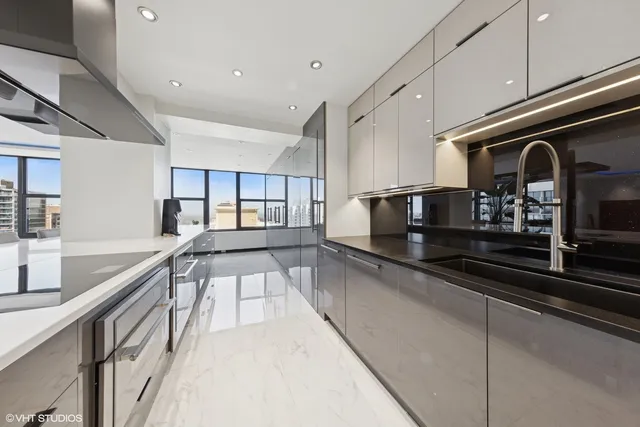 a view of a kitchen with lots of counter space