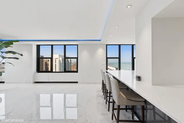 a hallway with a large window and mirror