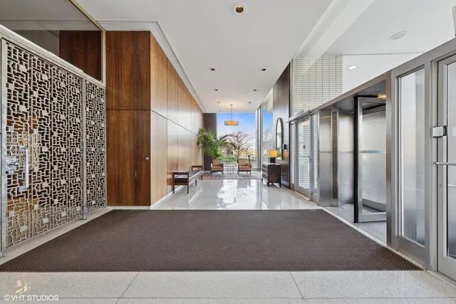 a view of a living room and a balcony