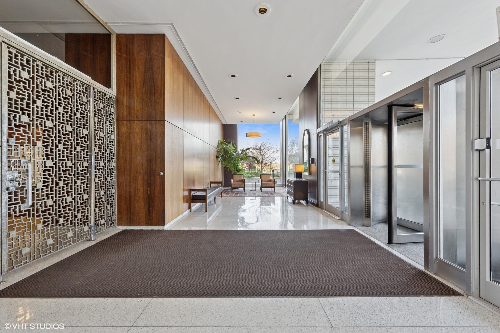3150 North Lake Shore Drive, Unit 27F Chicago, IL 60657 - Photo 2 of 31 a view of a living room and a balcony