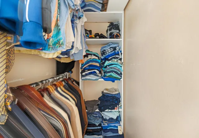 a view of game room with window and couch