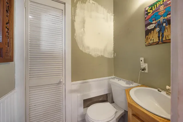 a kitchen with wooden cabinets and a stove