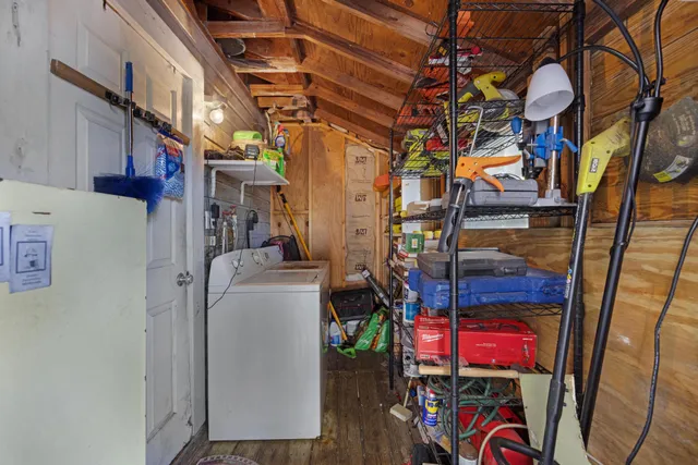 a view of a door and chair in the balcony