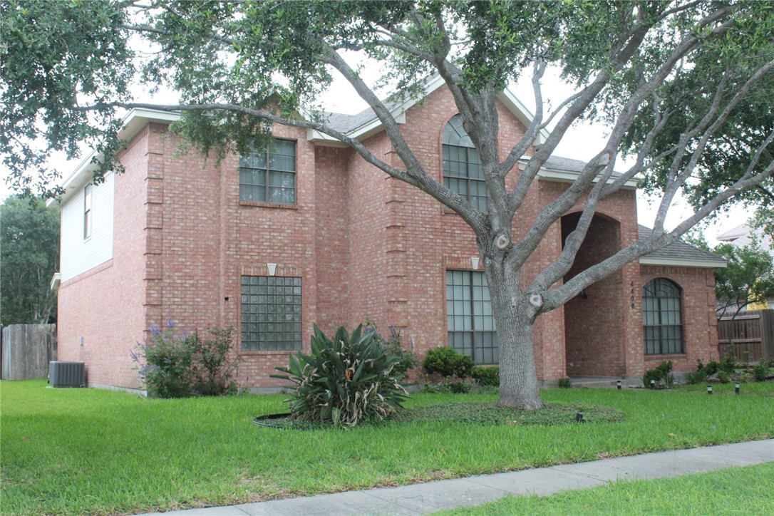 4406 Pontchartrain Drive Corpus Christi, TX 78413 - Photo 2 of 21 a front view of a house with garden