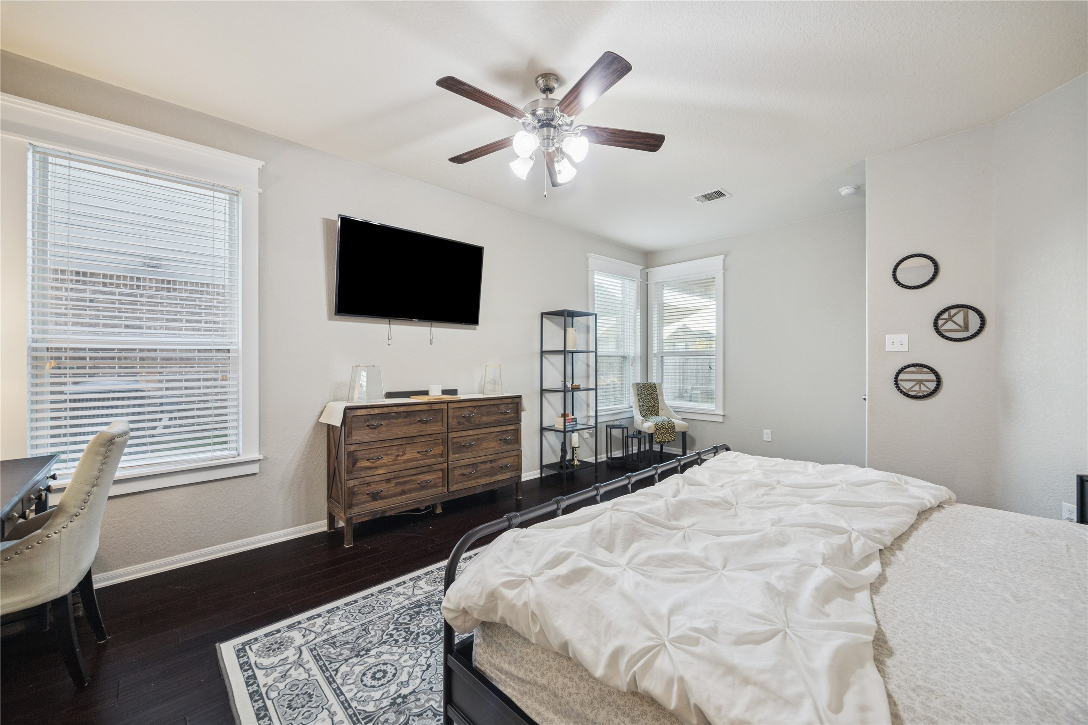 3026 Currier Court Rosenberg, TX 77471 - Photo 14 of 22 a bedroom with a bed and flat screen tv