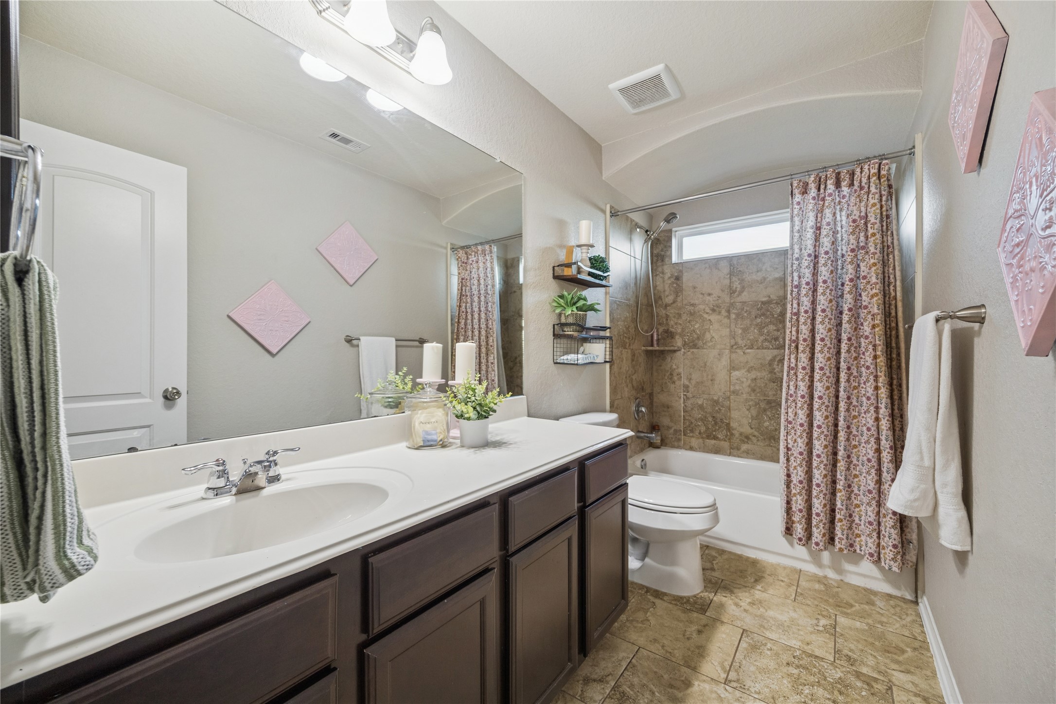 3026 Currier Court Rosenberg, TX 77471 - Photo 20 of 22 a bathroom with a sink a toilet a mirror and shower