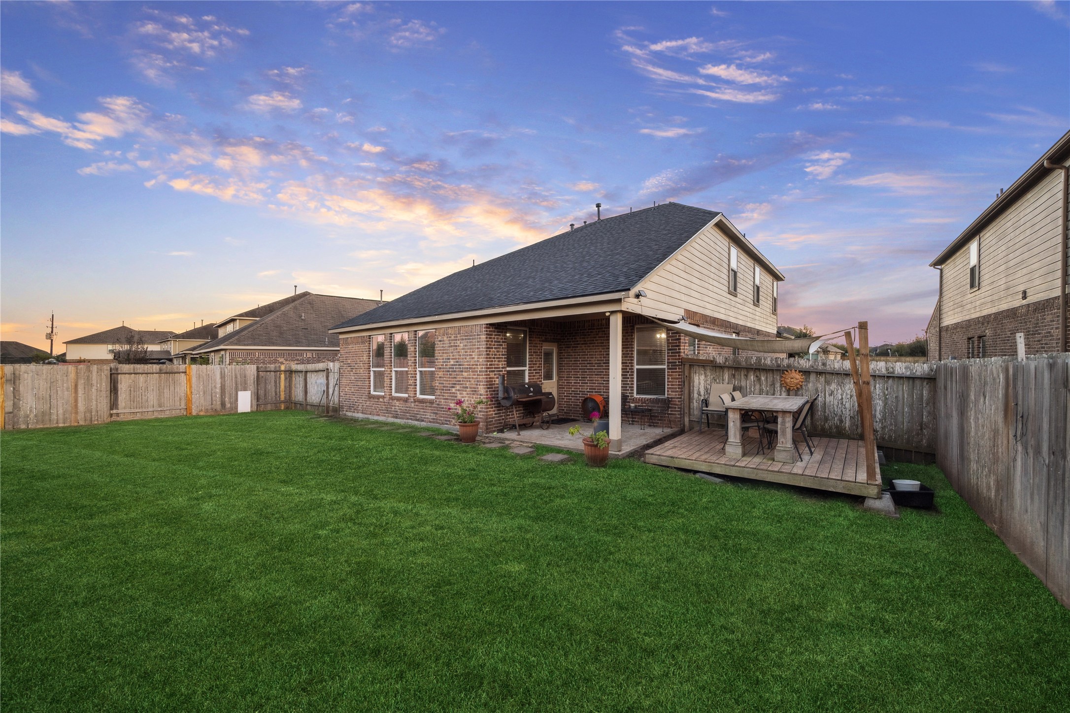 3026 Currier Court Rosenberg, TX 77471 - Photo 22 of 22 a view of a house with a yard and sitting area