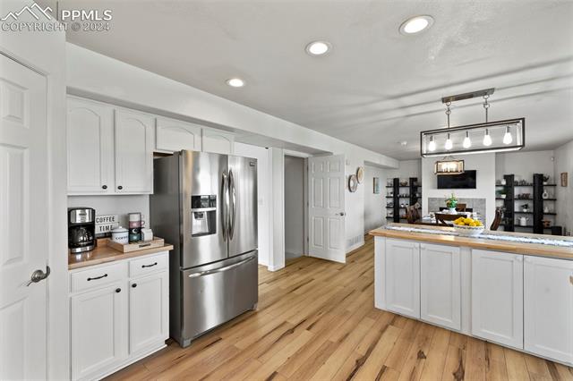 8205 Fort Smith Road Peyton, CO 80831 - Photo 10 of 49 A dream kitchen with a large island with eat-in convenience