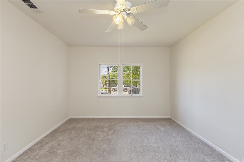 6650 Palm Avenue Riverside, CA 92506 - Photo 12 of 20 an empty room with a window and a fan
