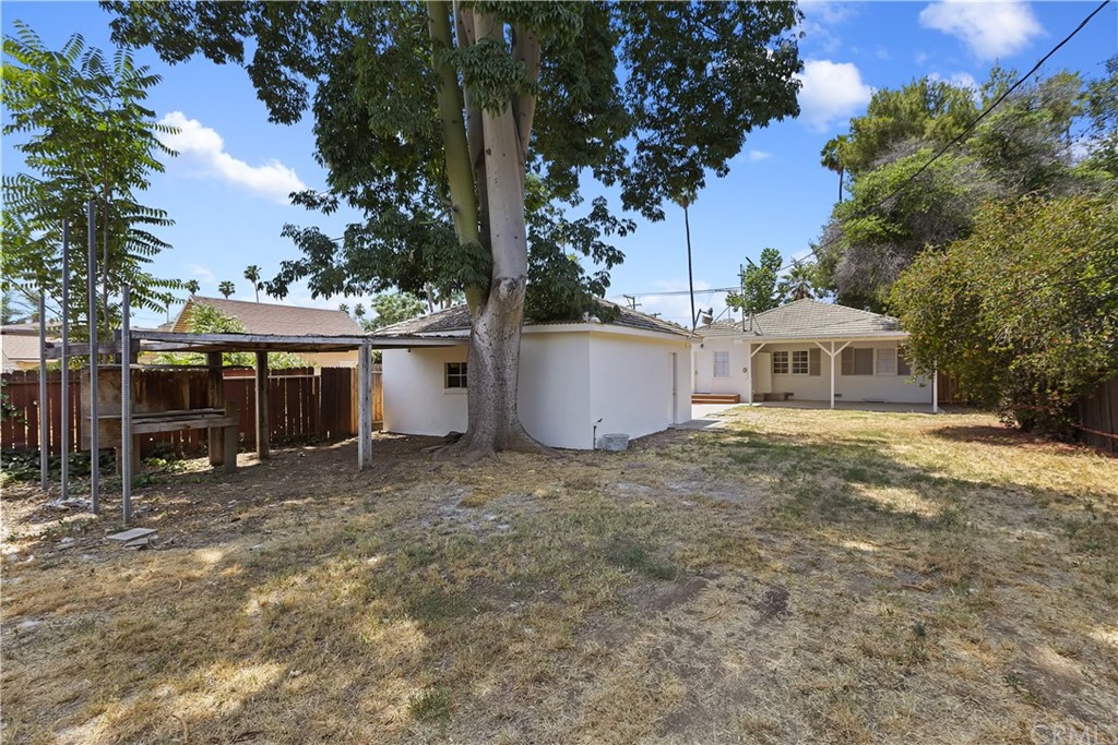 6650 Palm Avenue Riverside, CA 92506 - Photo 19 of 20 a house with trees in the background