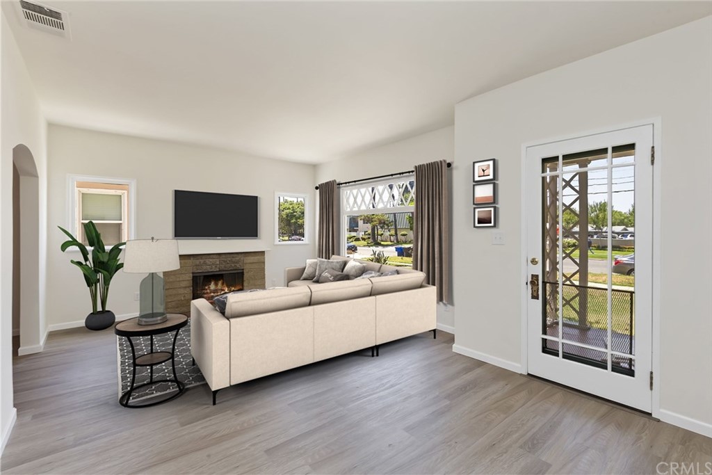 6650 Palm Avenue Riverside, CA 92506 - Photo 5 of 20 a living room with furniture and a flat screen tv