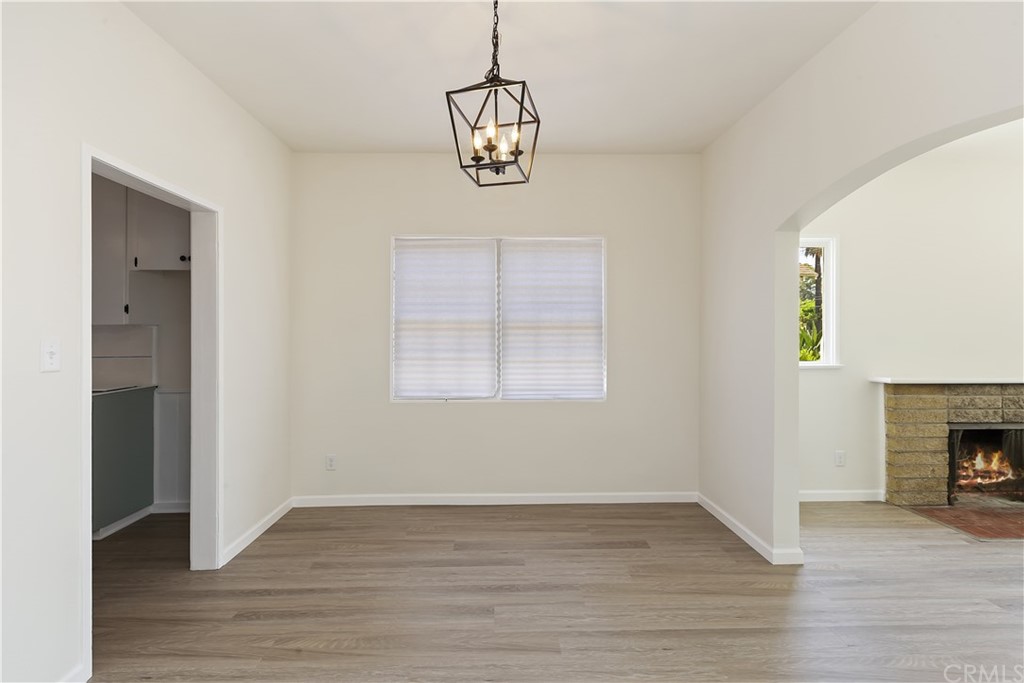 6650 Palm Avenue Riverside, CA 92506 - Photo 7 of 20 a view of empty room with wooden floor and fan