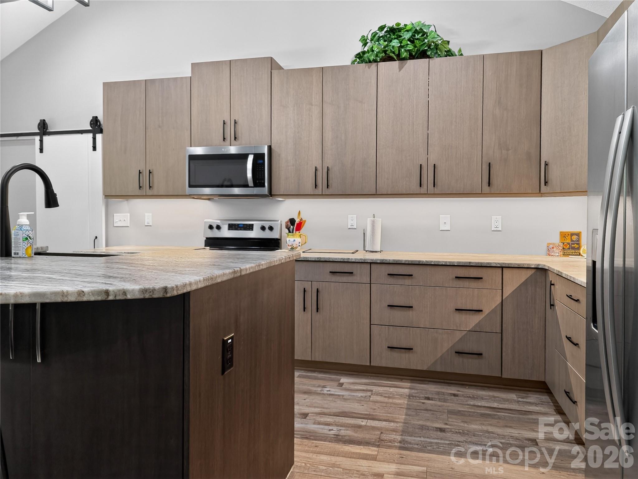 278 Hunters Trace Rutherfordton, NC 28139 - Photo 23 of 33 a kitchen with appliances cabinets and a sink