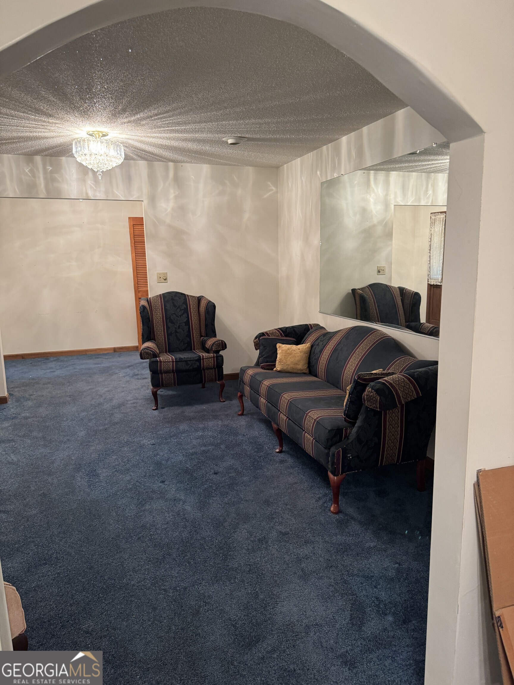 1936 Cedar Grove Road Soperton, GA 30457 - Photo 20 of 43 a living room with furniture and a window