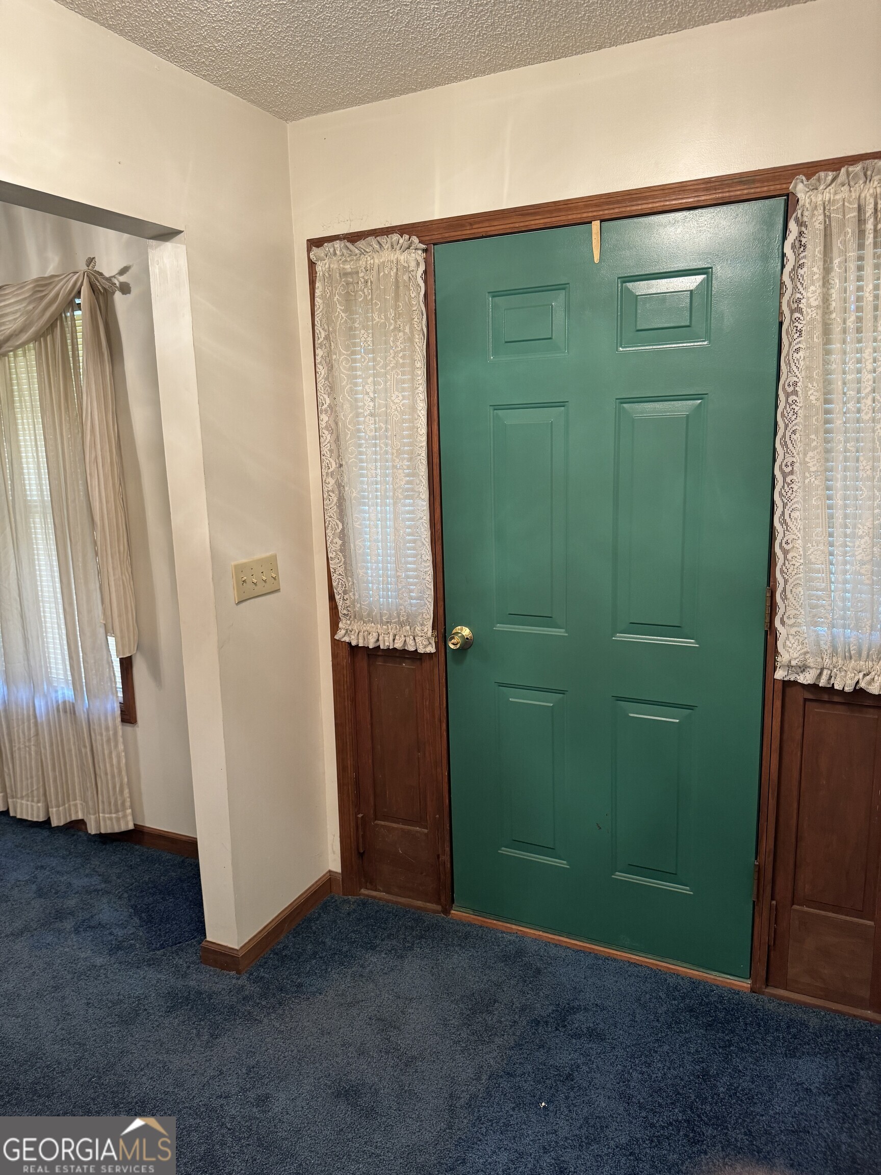1936 Cedar Grove Road Soperton, GA 30457 - Photo 27 of 43 an empty room with closet and a window