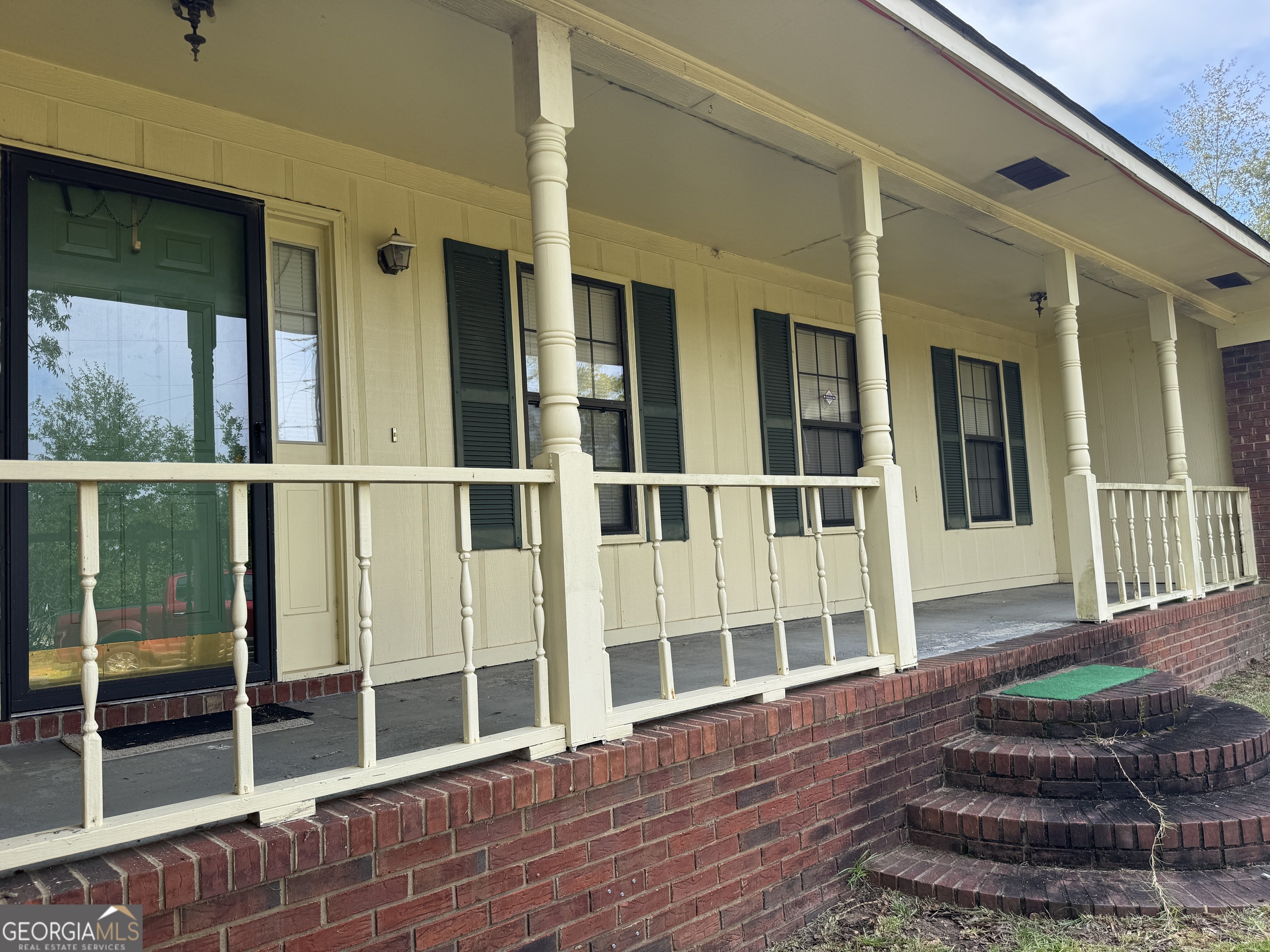 1936 Cedar Grove Road Soperton, GA 30457 - Photo 3 of 43 a view of front door and wooden floor