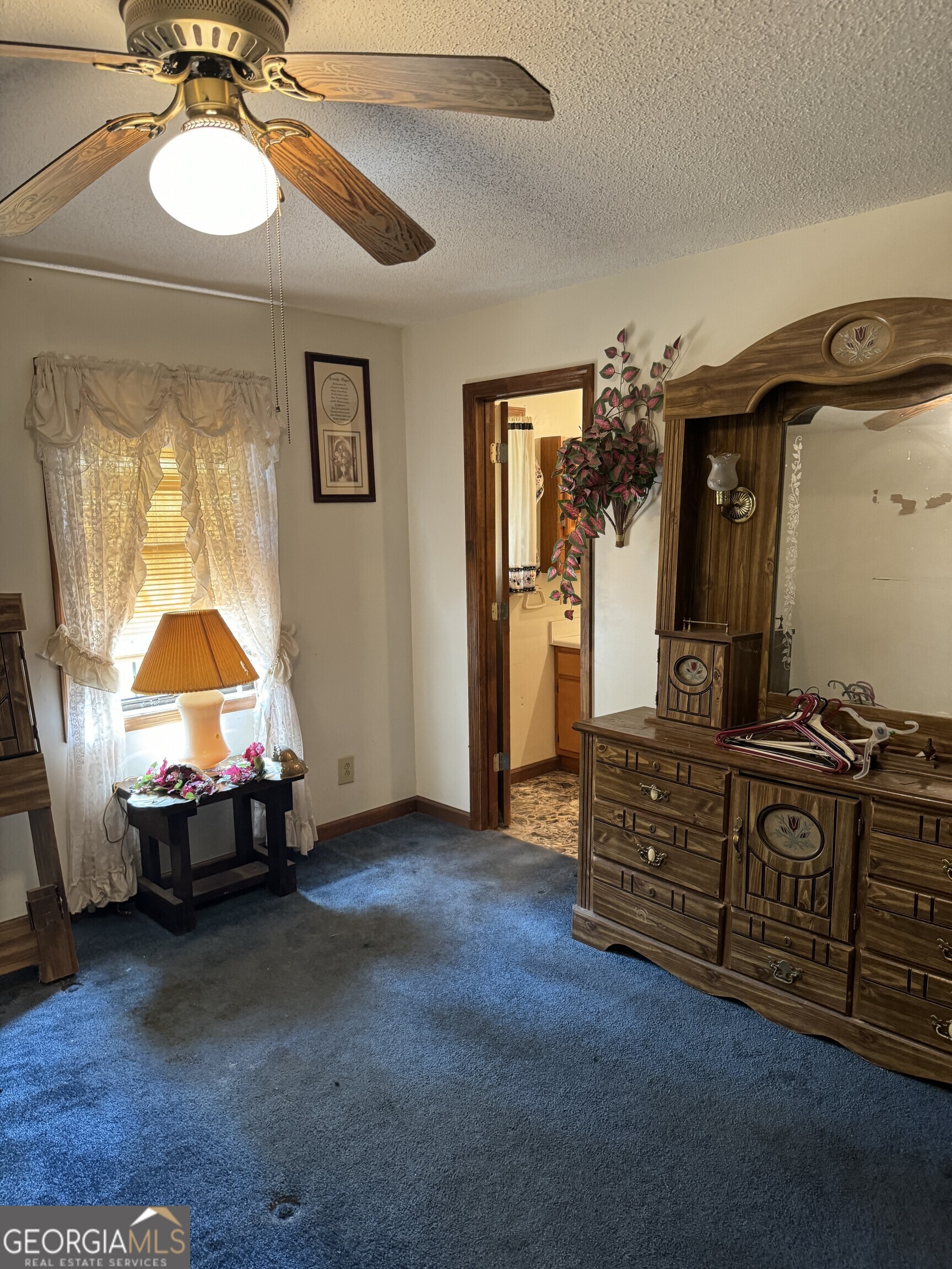 1936 Cedar Grove Road Soperton, GA 30457 - Photo 38 of 43 a living room with furniture and a flat screen tv