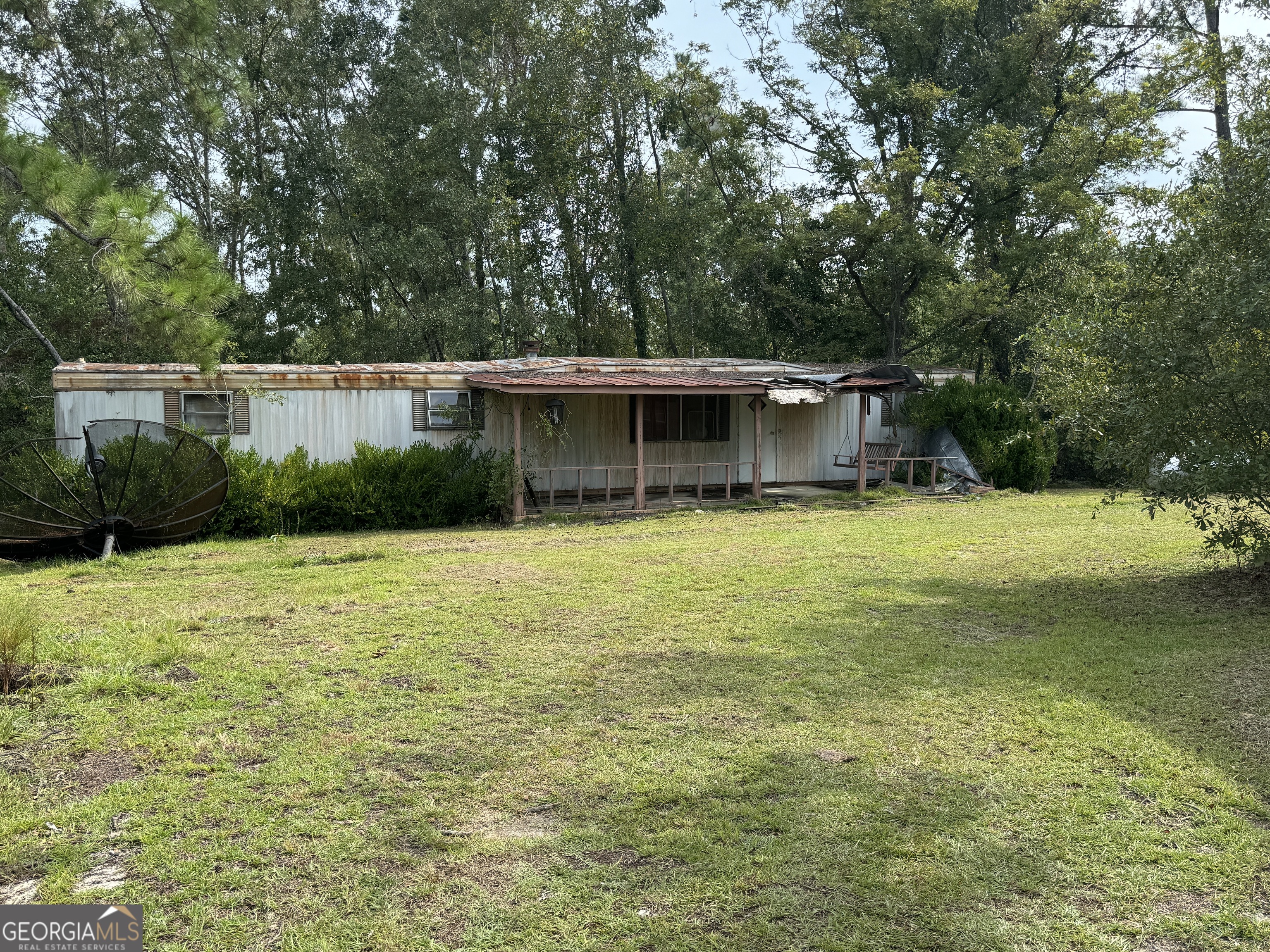 1936 Cedar Grove Road Soperton, GA 30457 - Photo 43 of 43 a house view with a outdoor space