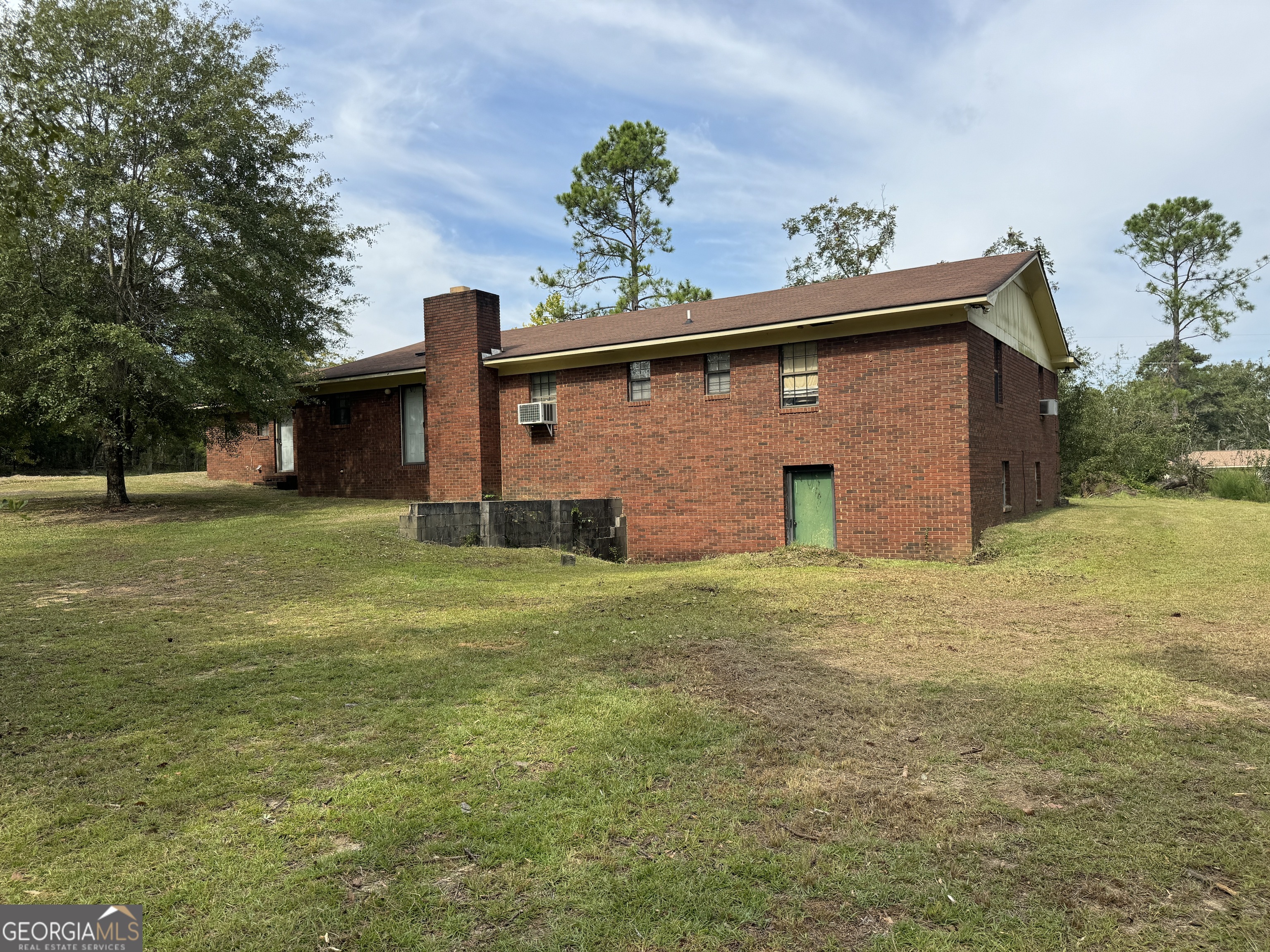 1936 Cedar Grove Road Soperton, GA 30457 - Photo 8 of 43 a front view of a house with garden