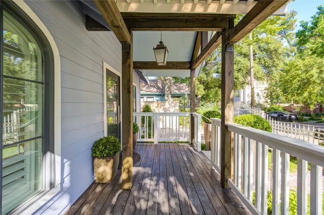 a view of a porch with wooden floor and outdoor space