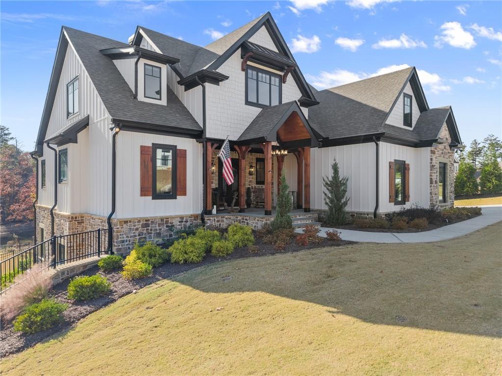 a front view of a house with garden