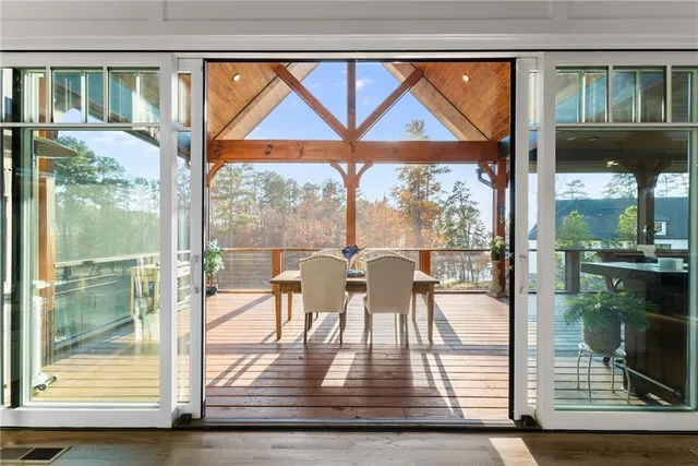 a outdoor space with patio couch and a fireplace