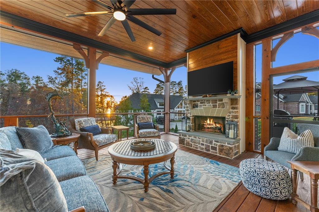 5431 Mayflower Court Gainesville, GA 30504 - Photo 22 of 64 a outdoor space with patio couch and a fireplace