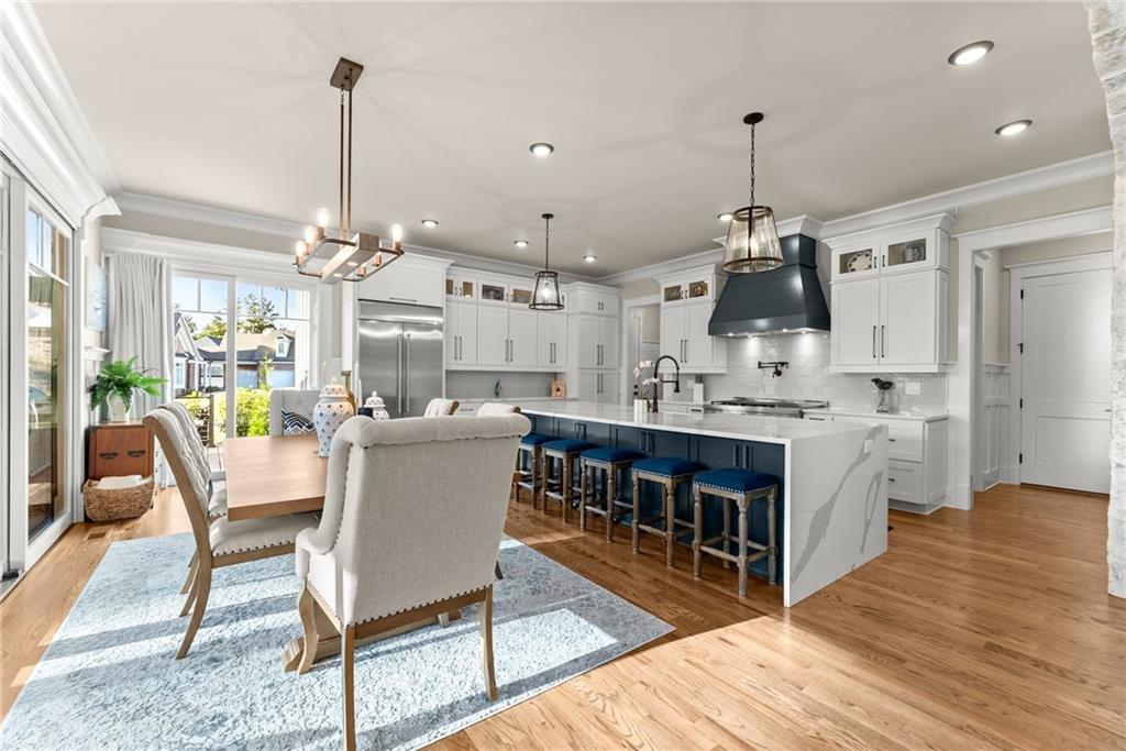 5431 Mayflower Court Gainesville, GA 30504 - Photo 26 of 64 a large kitchen with a table and chairs