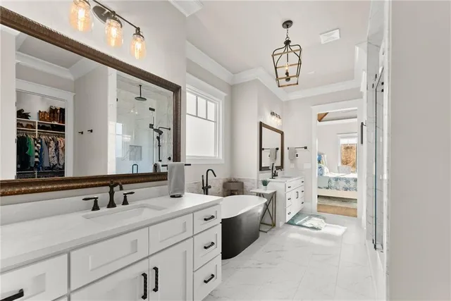 a bathroom with a granite countertop sink mirror and double
