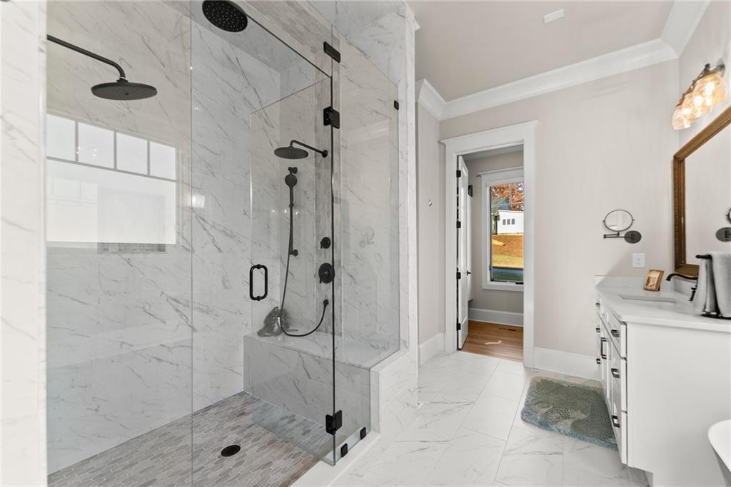 5431 Mayflower Court Gainesville, GA 30504 - Photo 39 of 64 a bathroom with a sink toilet and shower