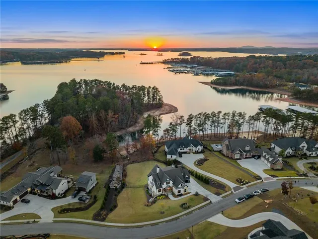 a front view of house with yard and outdoor seating