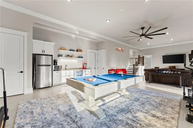 an aerial view of residential building with outdoor space and lake view