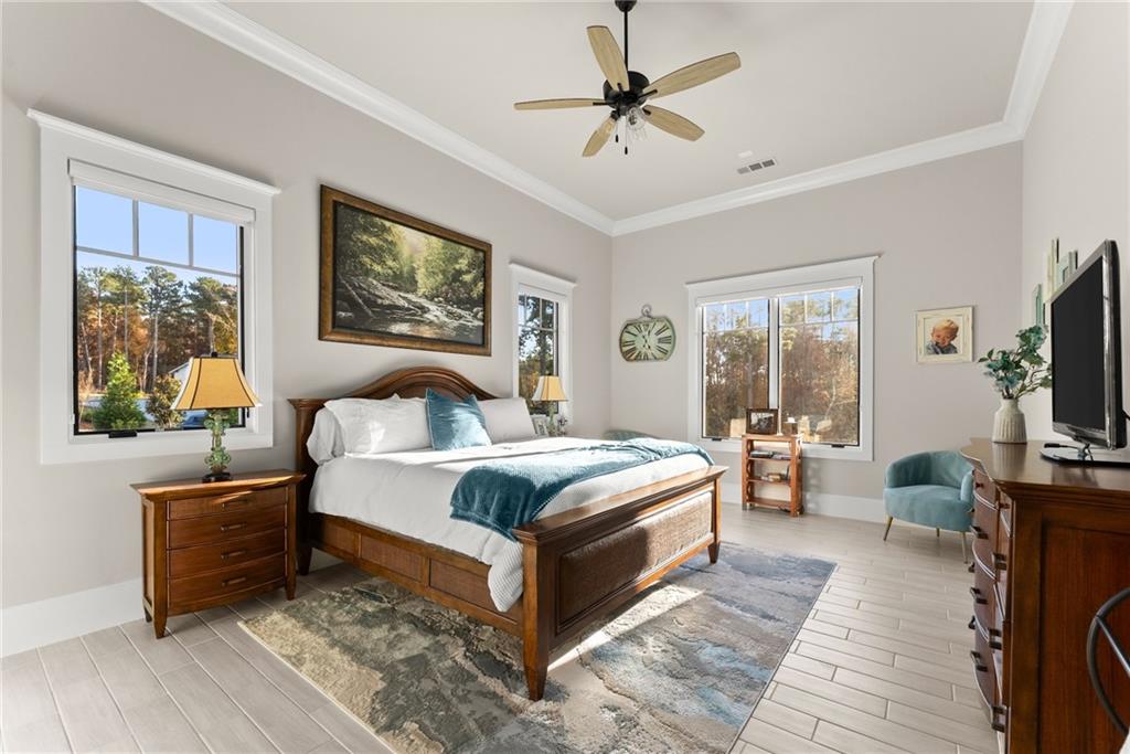 5431 Mayflower Court Gainesville, GA 30504 - Photo 50 of 64 a bed room with bed and a flat tv screen