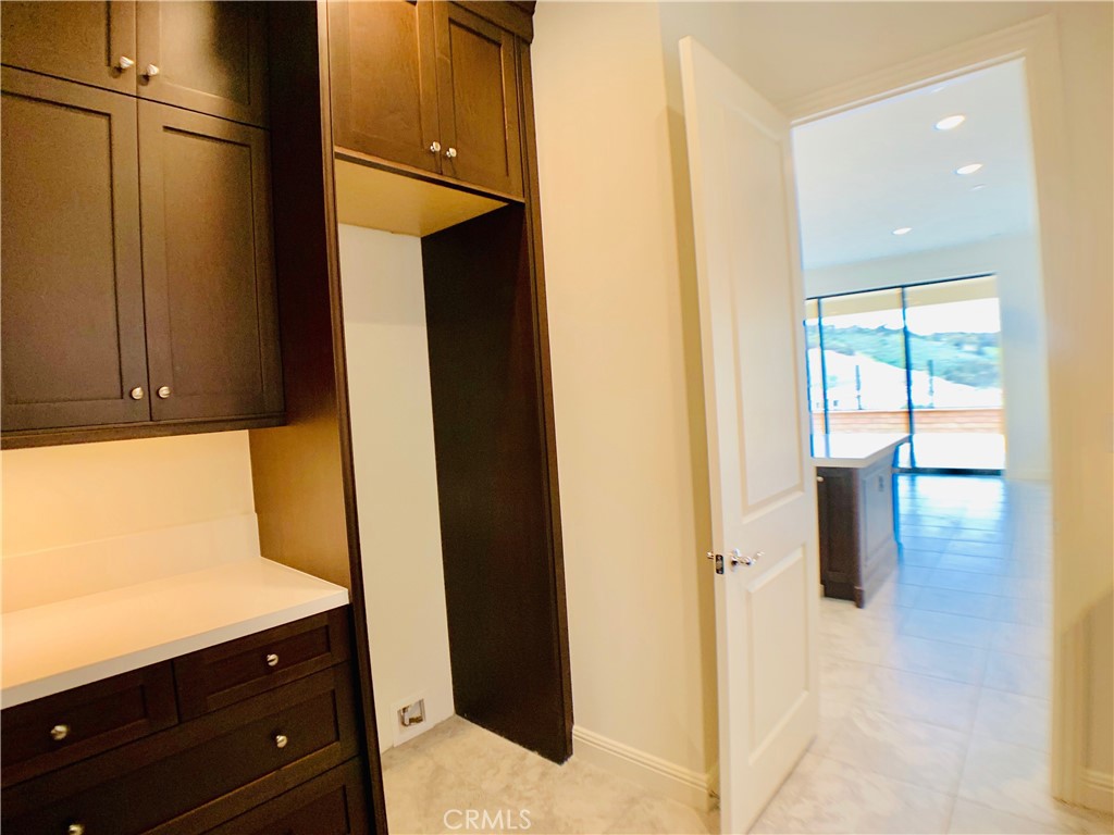 152 Leafy Pass Irvine, CA 92602 - Photo 12 of 55 a bathroom with a sink and mirror