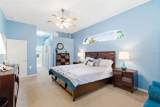 a large kitchen with stainless steel appliances granite countertop a stove and cabinets