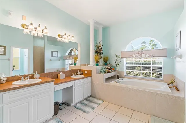 a bedroom with bed and a window