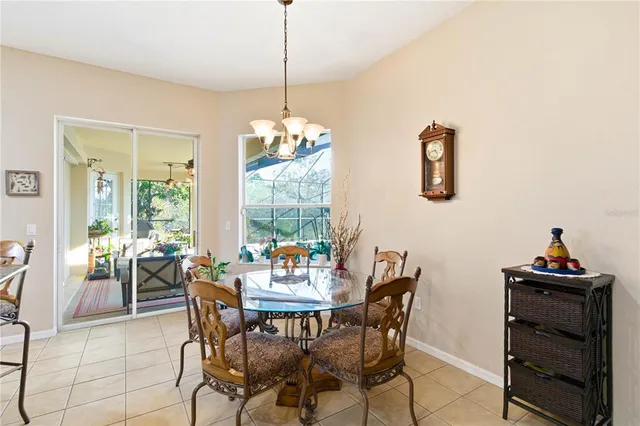 a view of swimming pool with outdoor seating