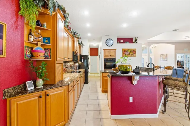 a view of a swimming pool with seating space