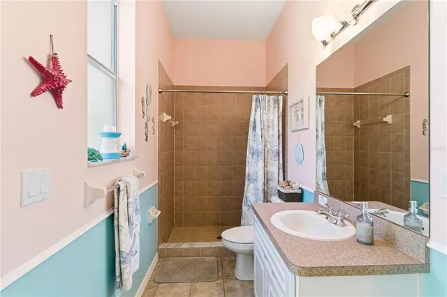 an aerial view of residential building with parking space