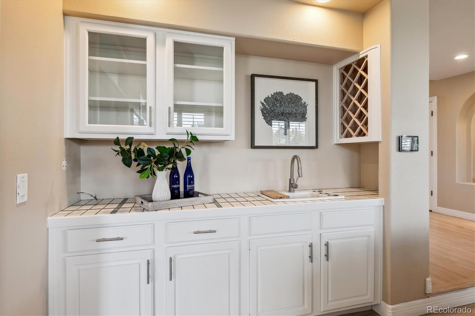 72 Falcon Hills Drive Highlands Ranch, CO 80126 - Photo 27 of 49 a bathroom with a sink and a mirror