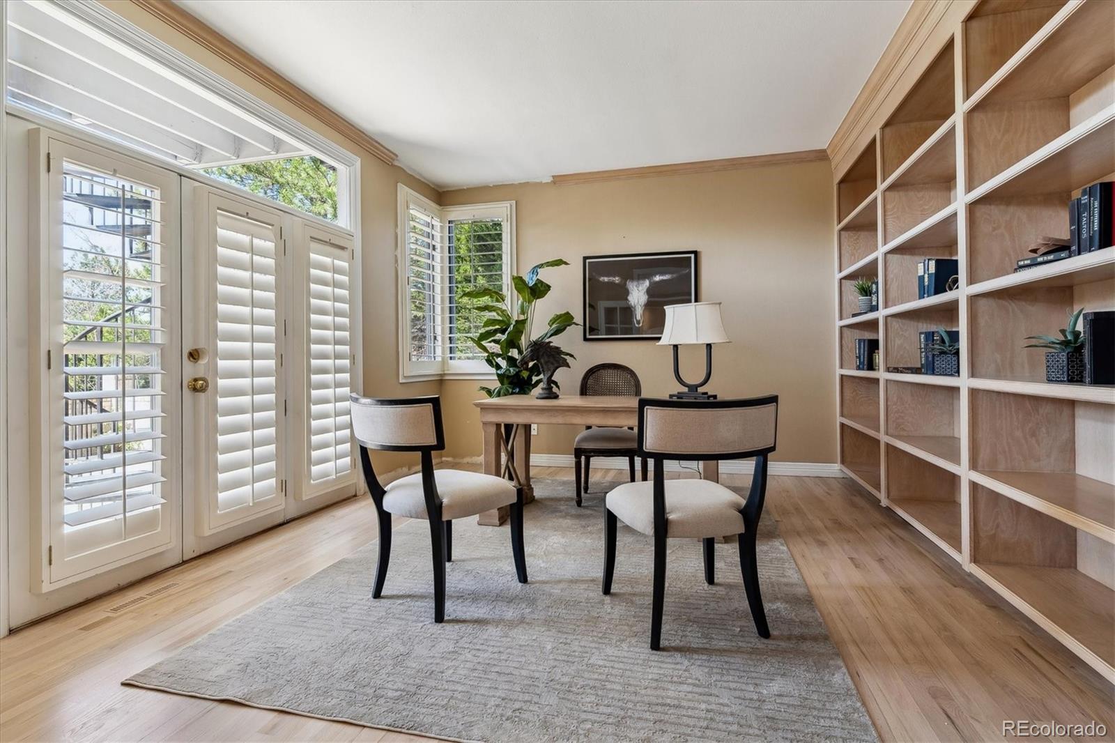 72 Falcon Hills Drive Highlands Ranch, CO 80126 - Photo 28 of 49 a view of a dining room with furniture and a window