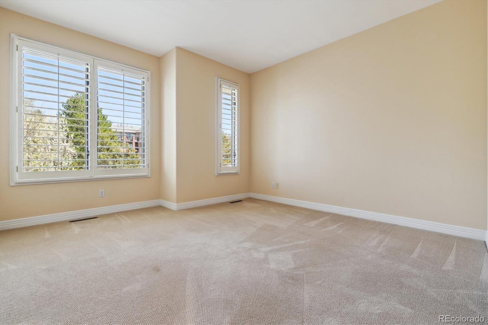 72 Falcon Hills Drive Highlands Ranch, CO 80126 - Photo 29 of 49 an empty room with windows