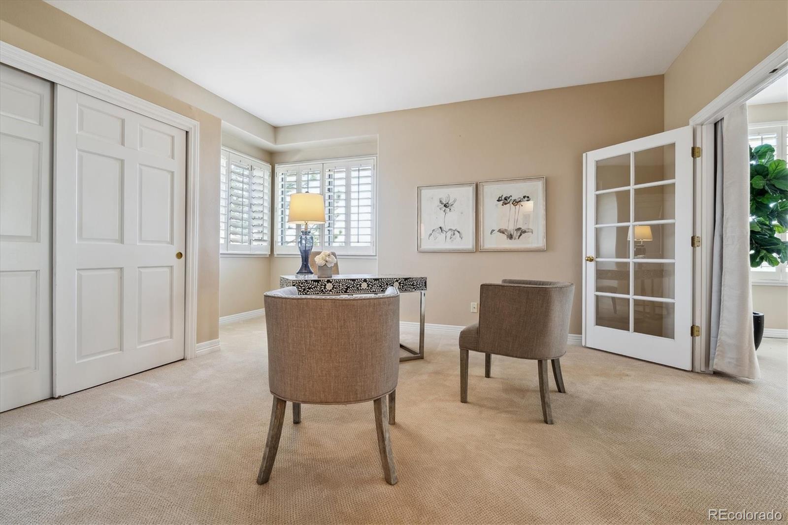 72 Falcon Hills Drive Highlands Ranch, CO 80126 - Photo 35 of 49 a view of a livingroom with furniture and a chair