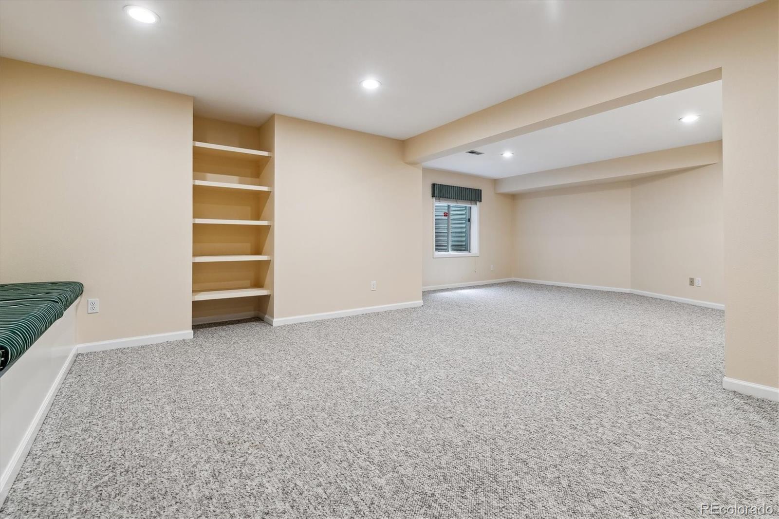 72 Falcon Hills Drive Highlands Ranch, CO 80126 - Photo 39 of 49 an empty room with a empty space and windows